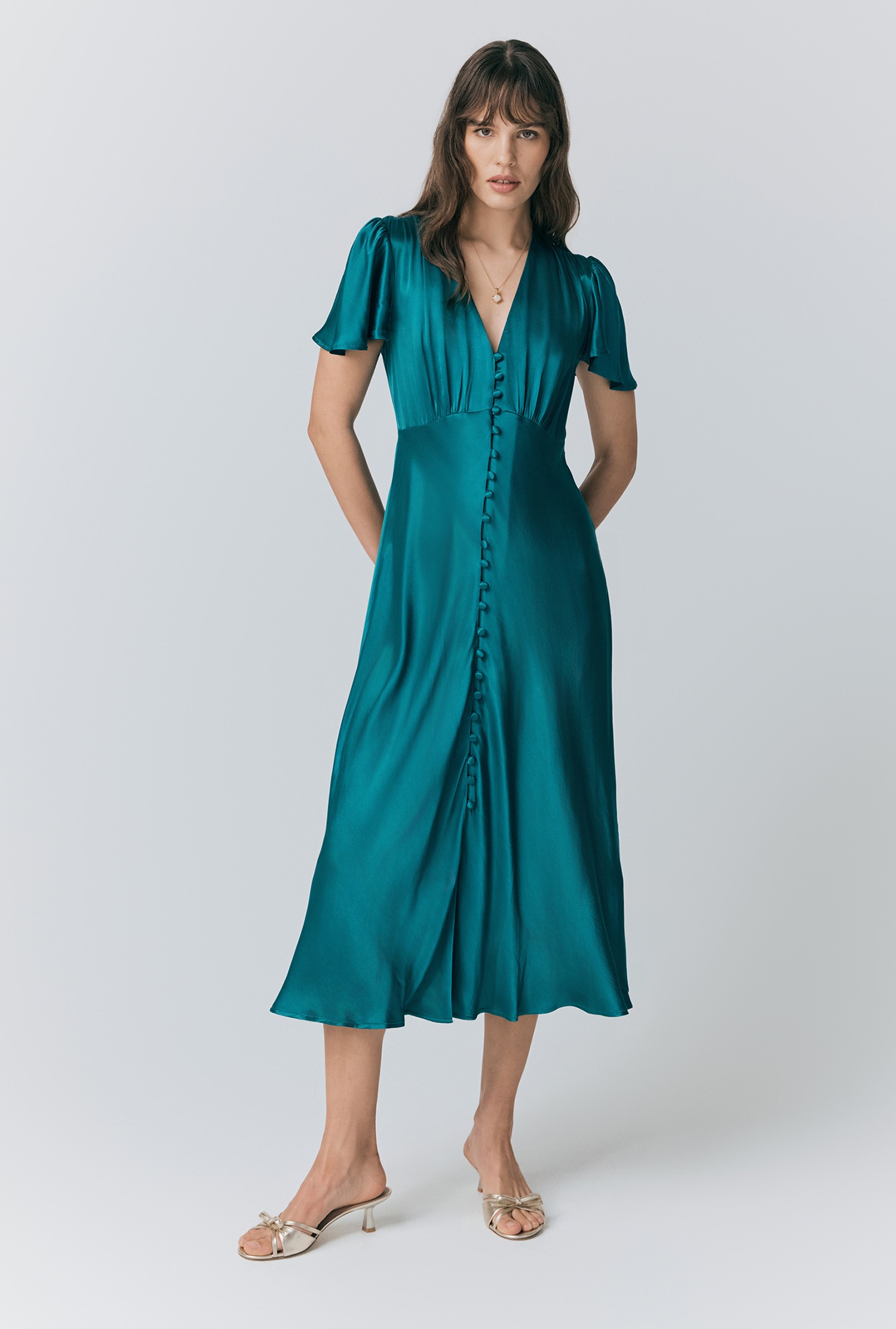 An image depicting Ghost Grace Satin Button V-Neck Dress