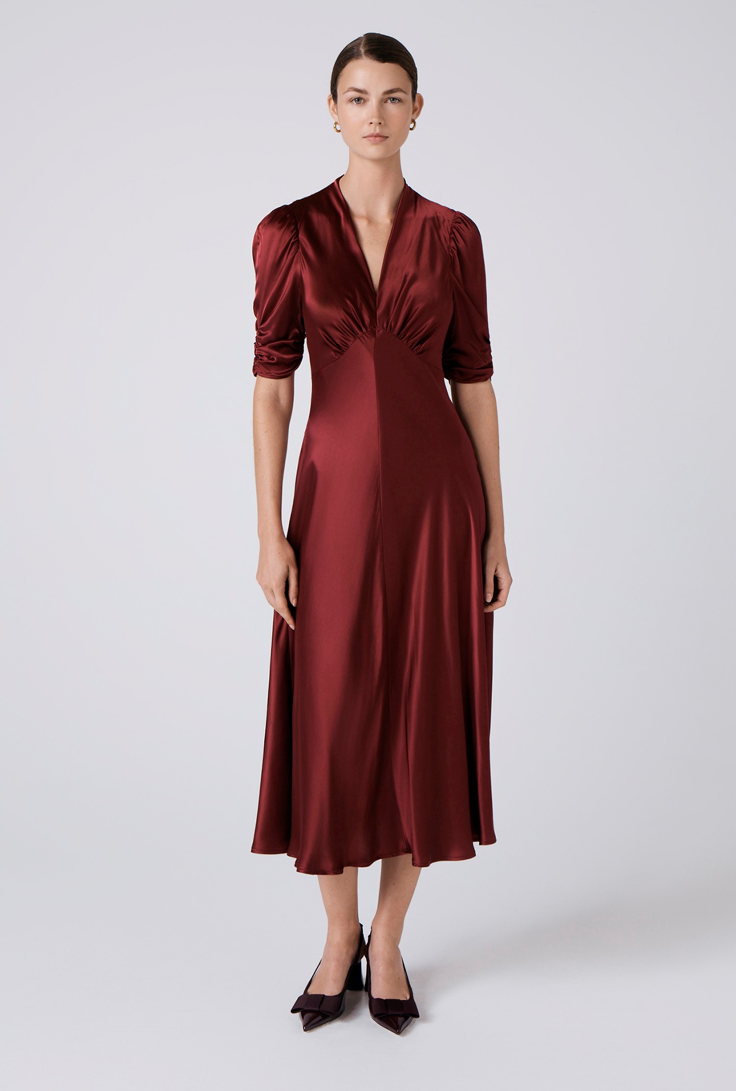 An image depicting Ghost Mia Satin V Neck Midi Tea Dress