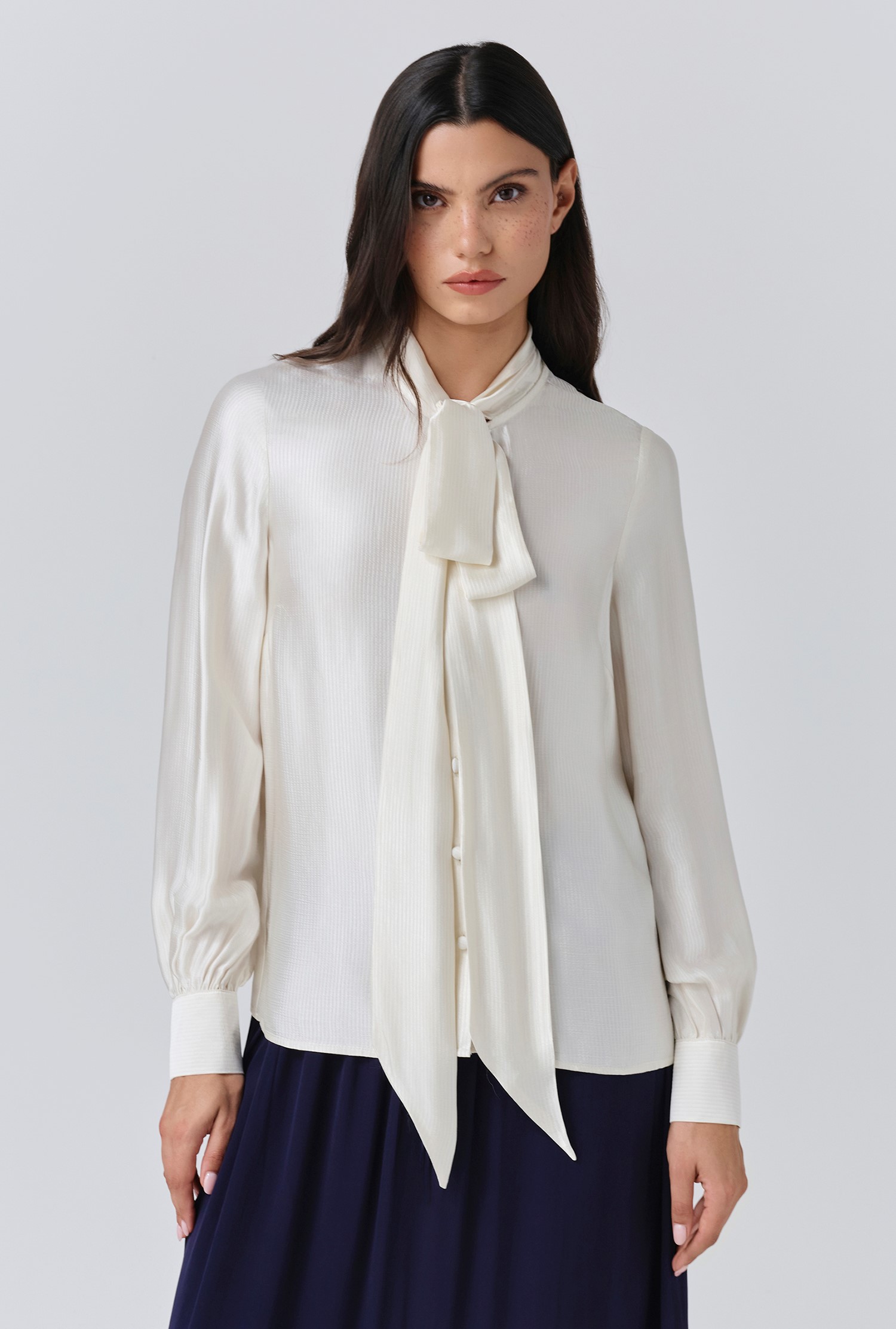 An image depicting Ghost Anna Satin Tie Neck Blouse